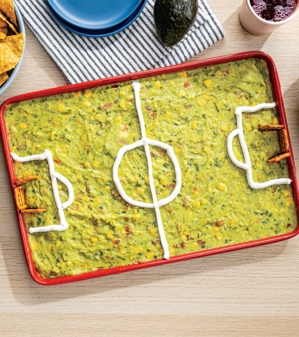 Soccer Field Guacamole with Corn & Tomato