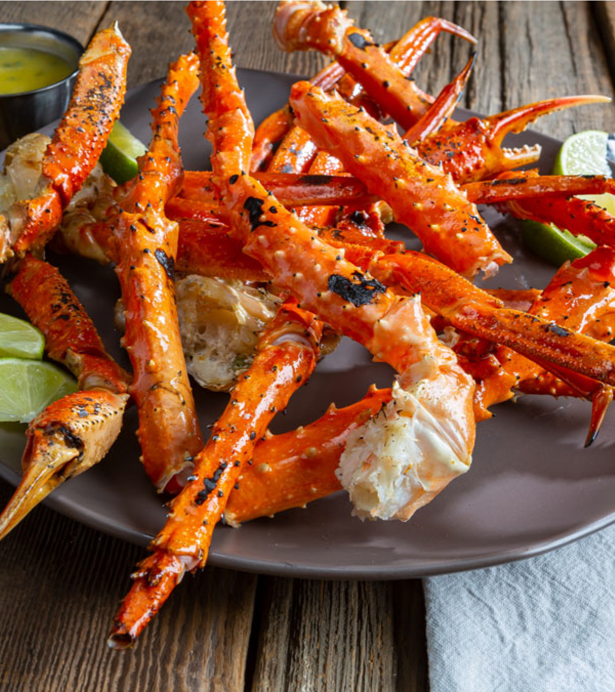 Grilled Crab Legs with Spicy Mustard Sauce & Basil-Lime Butter