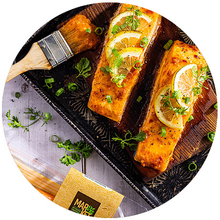 Harissa Cedar Plank Salmon with Herb Yogurt Sauce